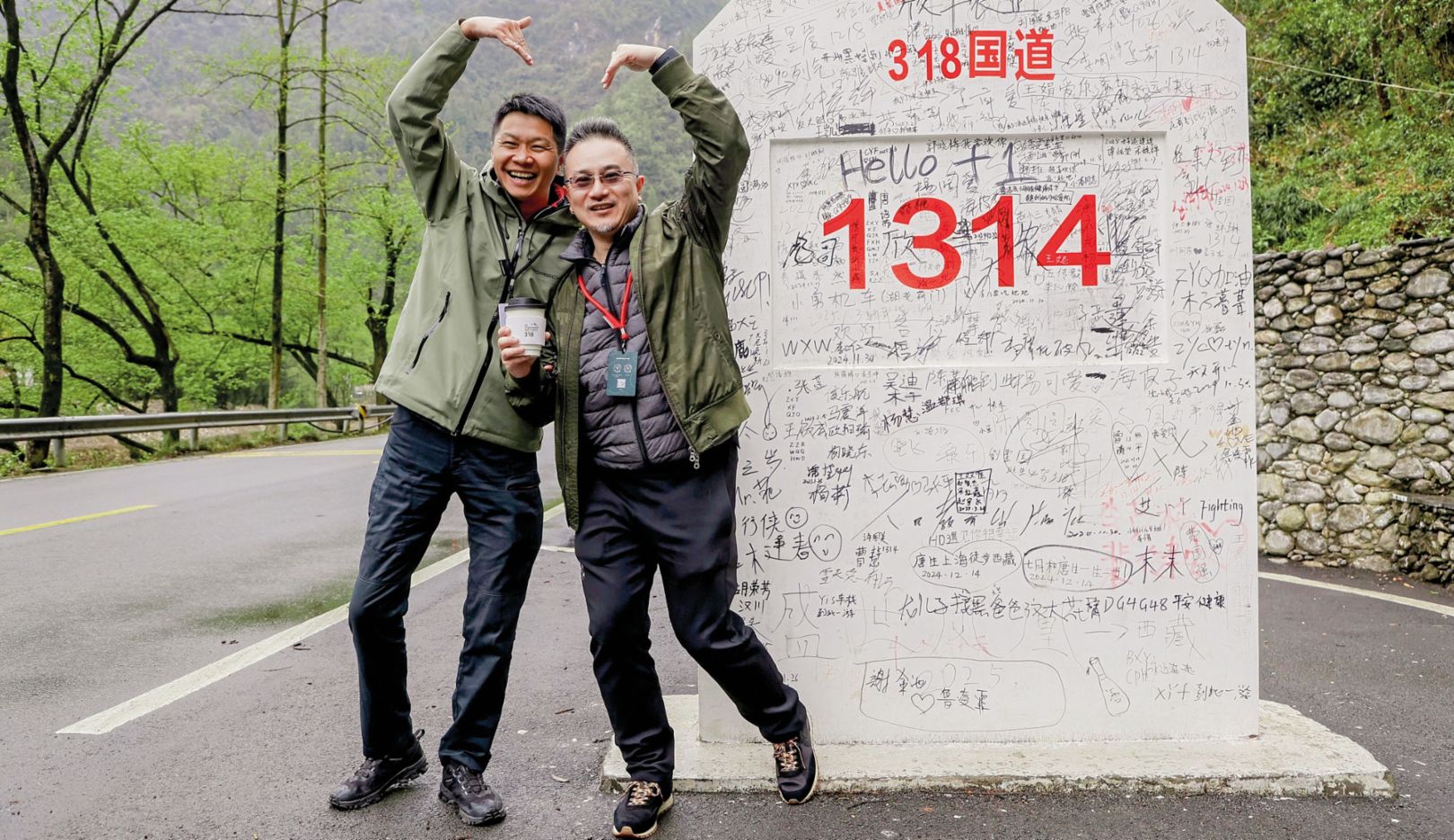 Photo stop: According to Wan Fang (right), everyone should drive National Highway 318 at least once in their lifetime. And this was his chance.