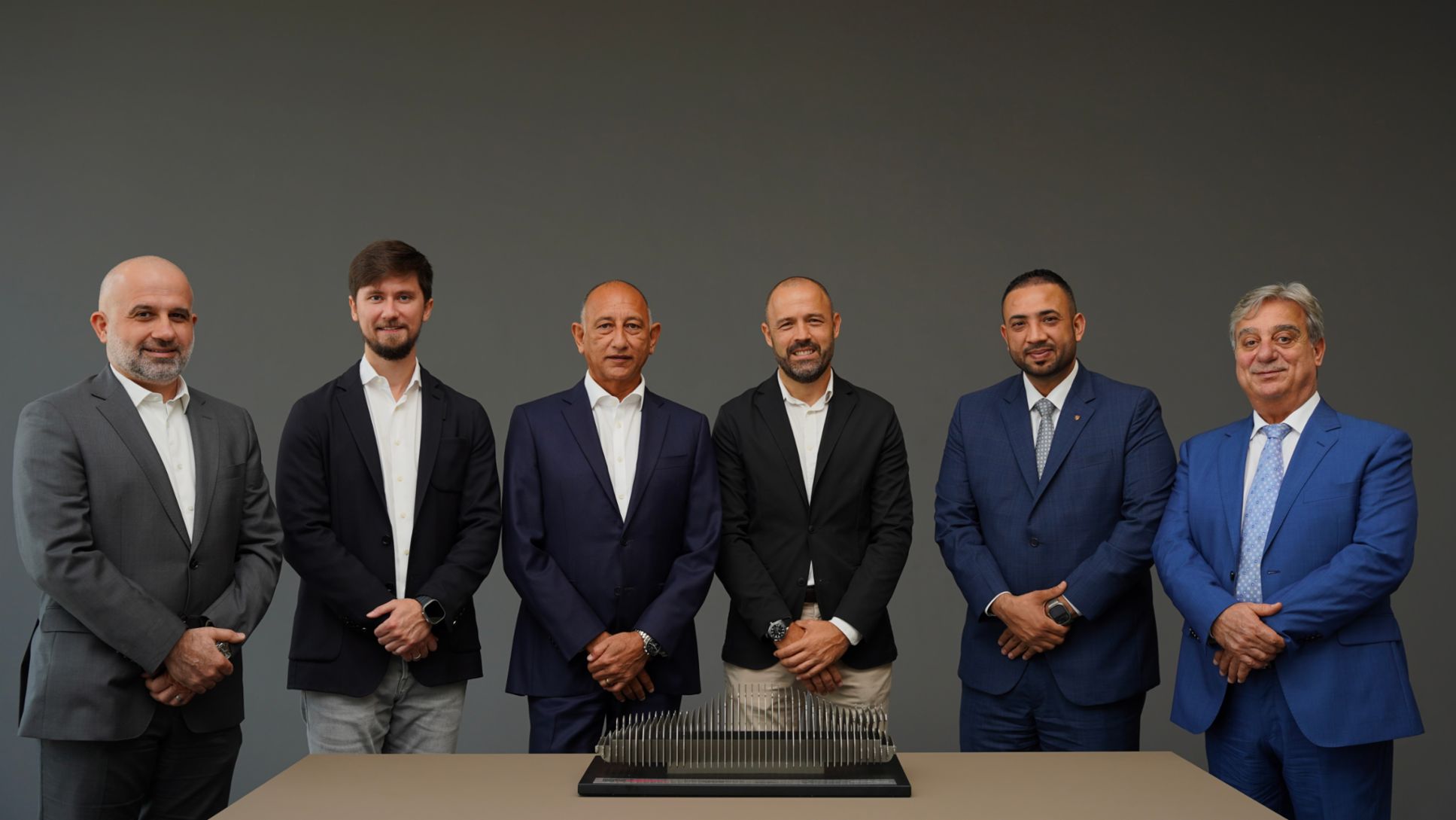 Omar Salim Al Mathno, National After Sales Manager, Igor Solomakha, National Marketing Manager, Mark Sinclair, General Manager,  Victor Dalmau, Chief Operating Officer, Ahtasham. A. Malik, National Manager Sales, Hussein Obeidat, Sales Manager ( Preowned), l-r, 2025, Porsche Middle East