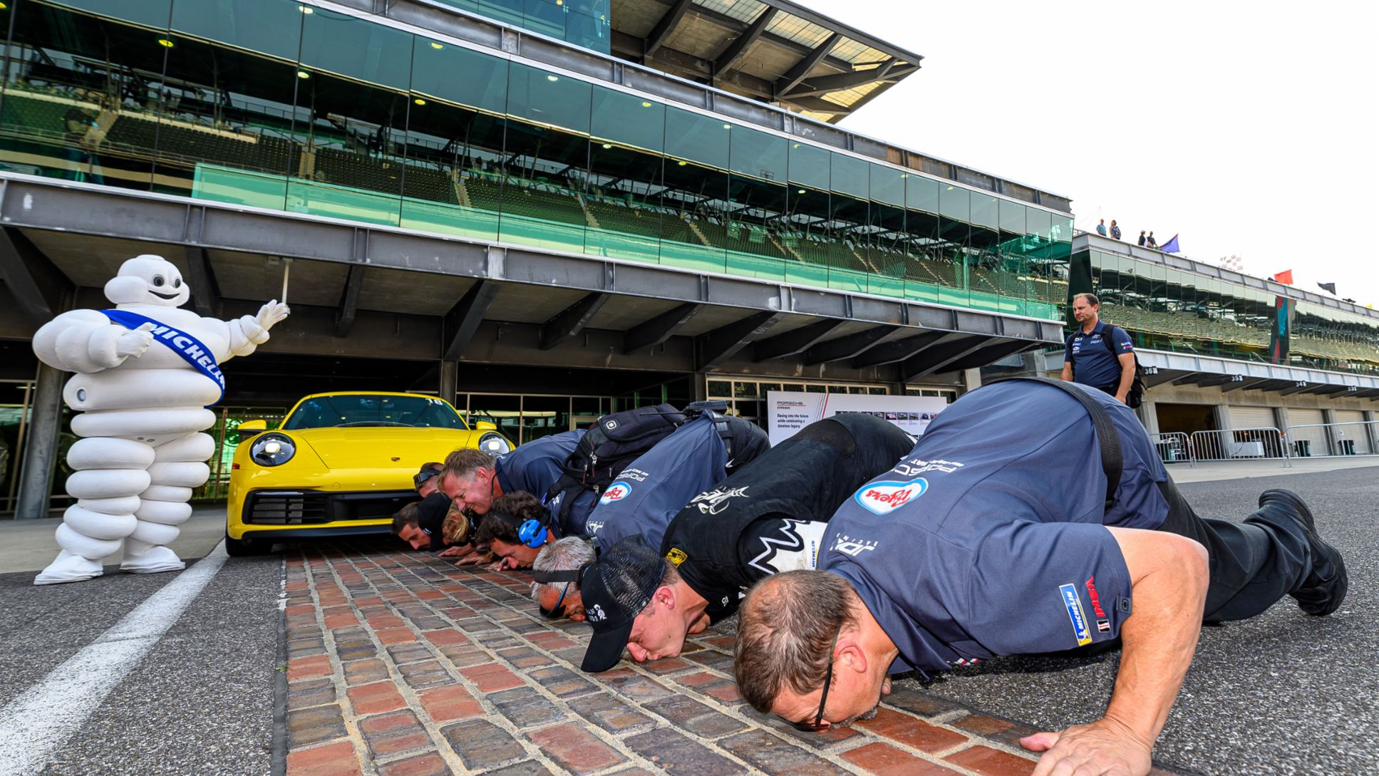 Porsche 911 GT3 Cup - No. 9 JDX Racing - Parker Thompson (CAN) and JDX Racing - Race 2 Celebration, Kissing the Bricks, Indianapolis Motor Speedway, Speedway, Indiana, USA, 2021, PCNA
