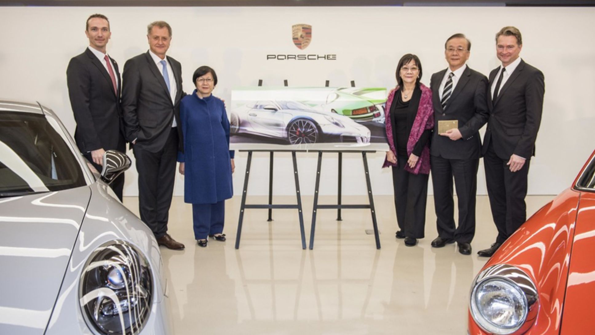 Martin Limpert, the new CEO of Porsche Taiwan; Detlev von Platen, Member of the Executive Board, Sales and Marketing, Porsche AG; Jane Tang, Chairman of Universal Motor Traders; Julie Tang, Chairman of Pan German Universal Motors Lts. Co., James Tang, Chairman of Universal Pan German Organization; Matthias Becker, Vice President Overseas and Emerging Markets; l-r, Porsche AG, 2017