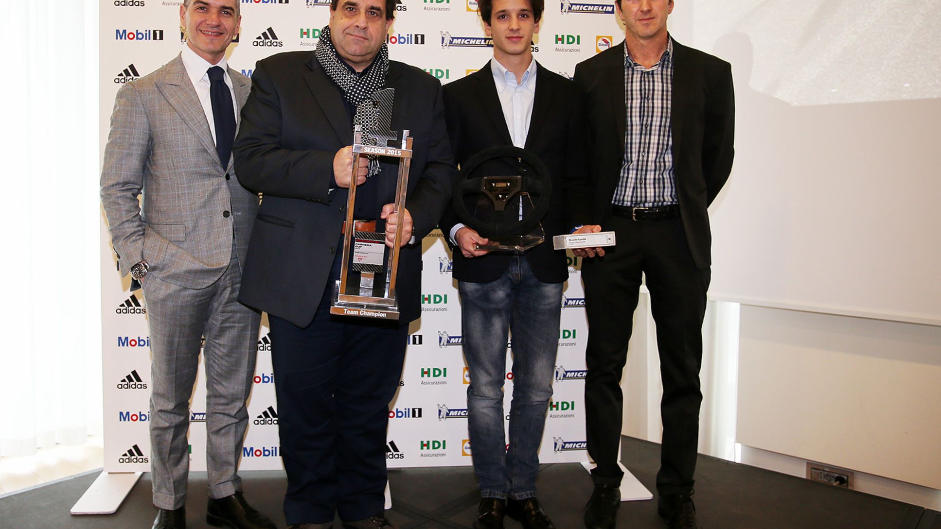 Premiazione Porsche Carrera Cup Italia 2015. Da sinistra Massimiliano Cariola Direttore Marketing di Porsche Italia, Stelios Fakalis Team Manager Tsunami RT, Riccardo Agostini vincitore Porsche Carrera Cup Italia 2015 e Max Busnelli Responsabile Sportivo Porsche Carrera Cup Italia