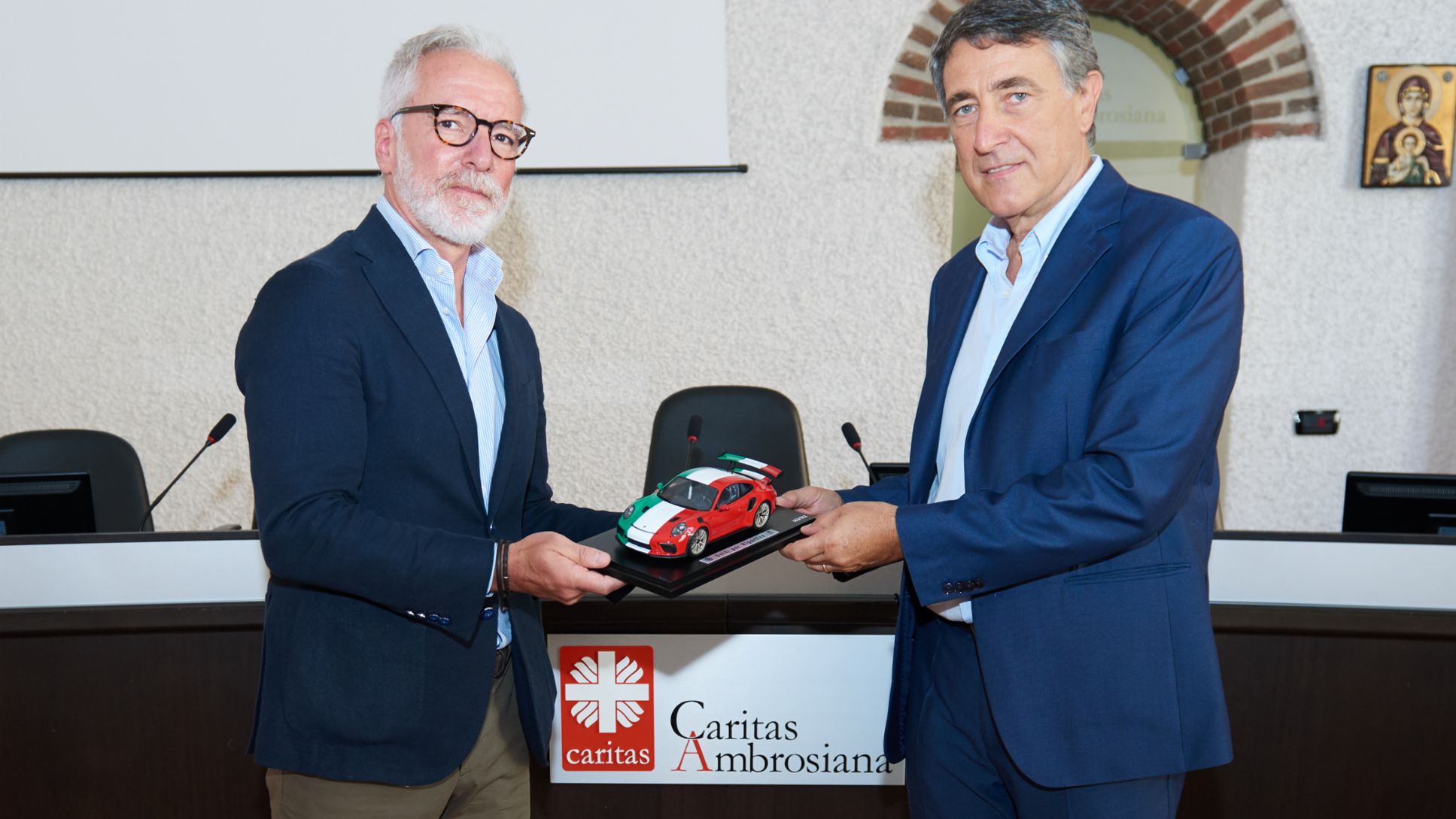 Uniti per Ripartire: Pietro Innocenti, Amministratore Delegato Porsche Italia e Luciano Gualzetti, Direttore Caritas Milano