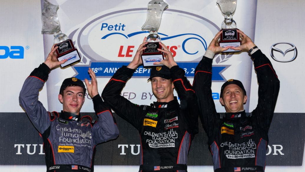 Madison Snow, left, celebrates 2015 Petit Le Mans podium