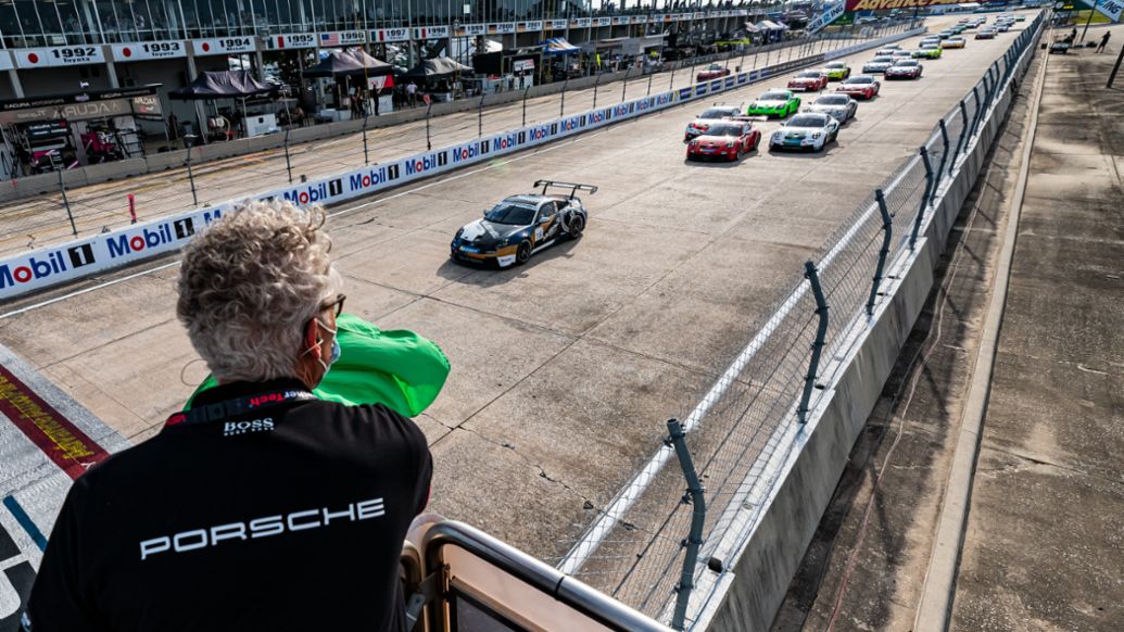 Porsche Carrera Cup North America - Sebring - Race 1 - Dr. Daniel Armbruster Waves the Green Flag to Start the Race 1, 2021, PCNA