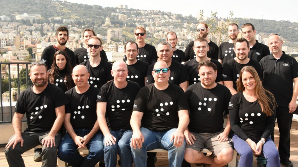 1st Row, Third from Left, Left to Right: CEO Amit Nisenbaum, VP Business Development Eitan Grosbard, and Founder/CTO Boaz Mizrachi, 2019, Porsche AG