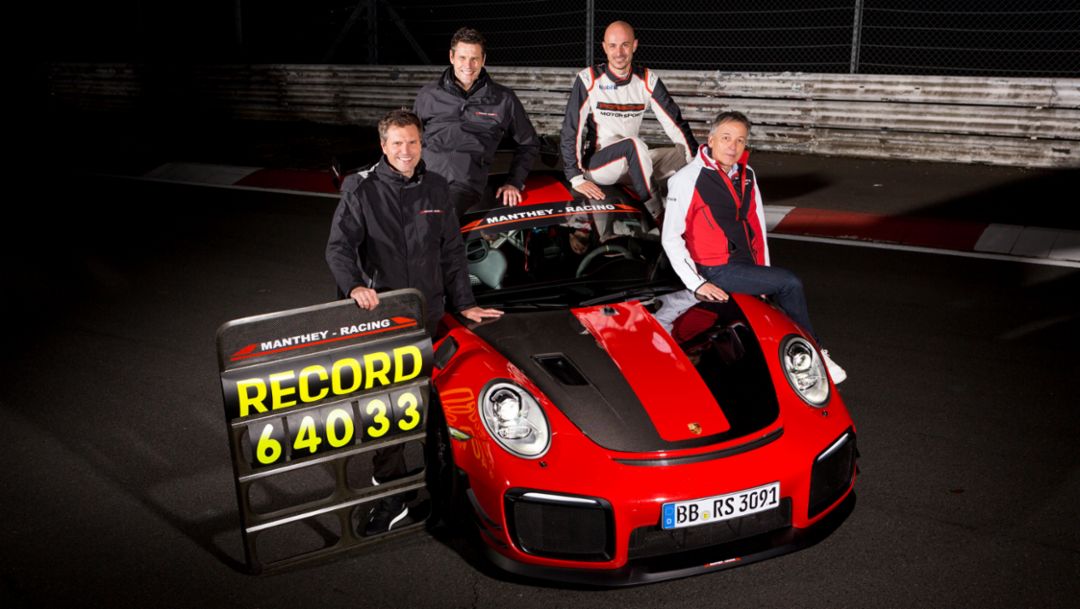 Martin Raeder, Nicolas Raeder (both CEO Manthey Racing), Lars Kern (Porsche development driver), Eugen Oberkamm (Director Motorsport Complete Vehicle Engineering, l-r), 911 GT2 RS MR, Nürburgring-Nordschleife, 2018, Porsche AG