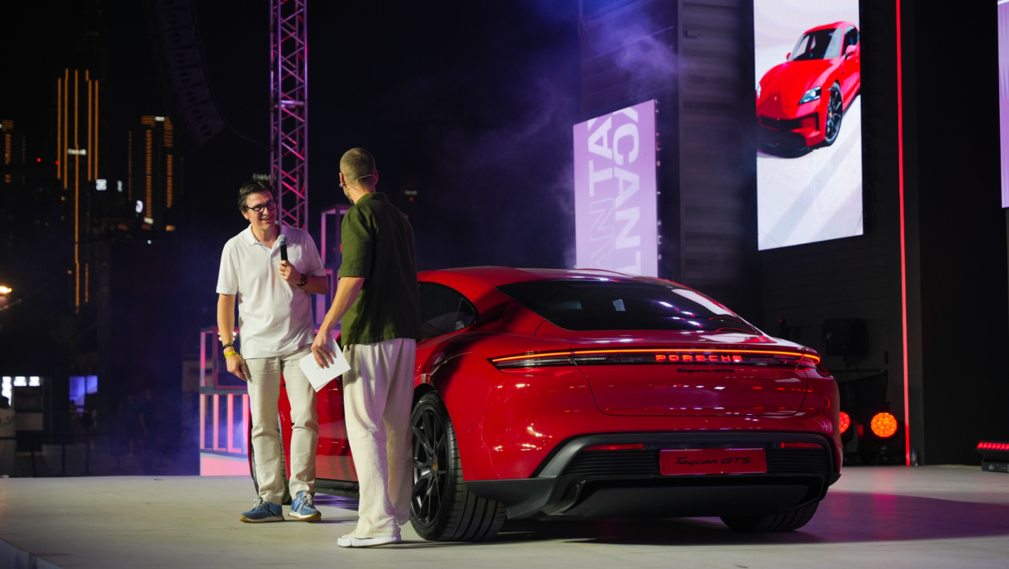 Kevin Giek, Vice President for Taycan Model Line, Porsche AG with the Taycan GTS at Icons of Porsche 2024 in Dubai