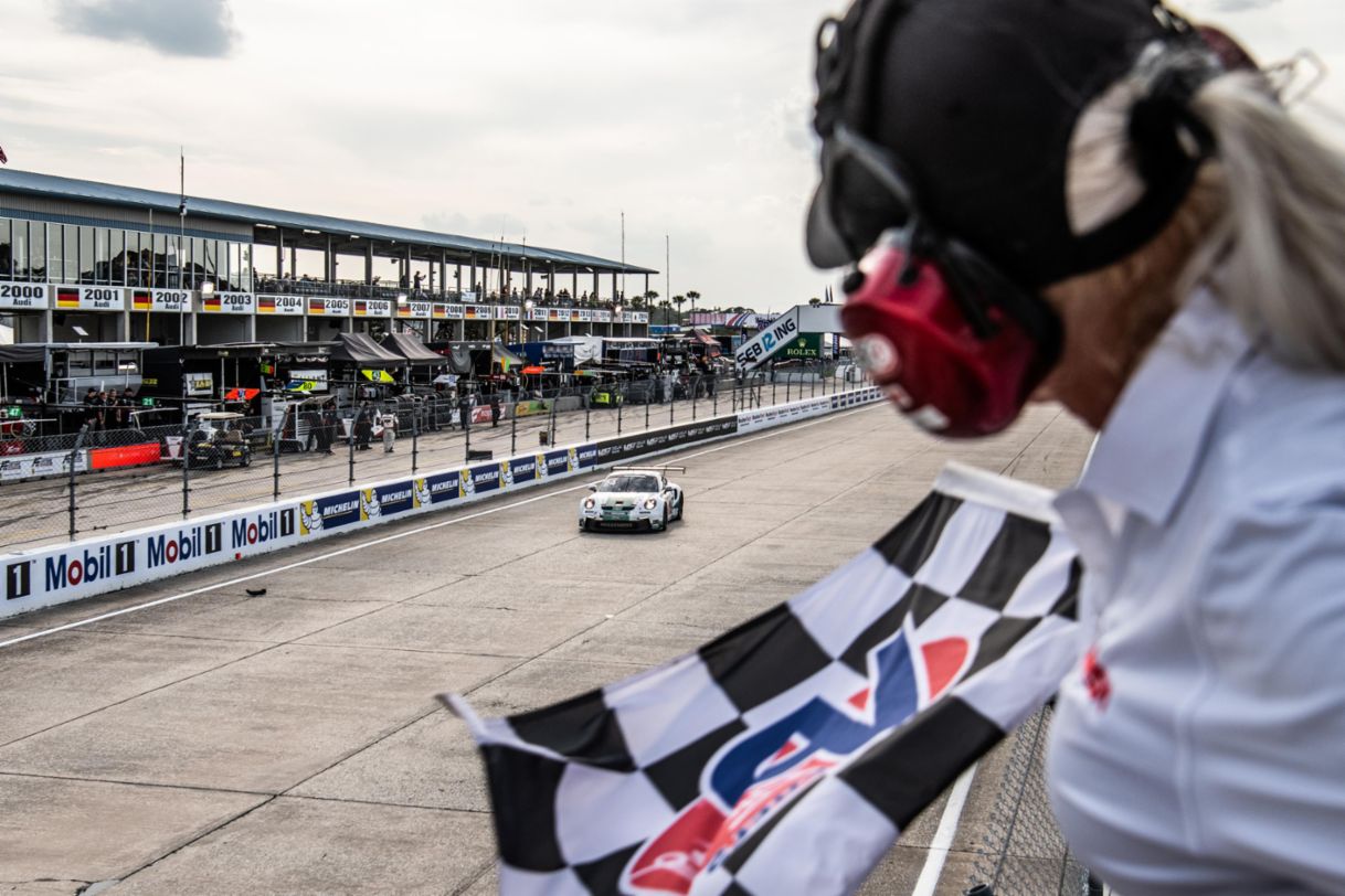 Sebring - PCCNA - Race 1 - Pro class winner - Loek Hartog - No. 24 Kellymoss Porsche 911 GT3 Cup - Checkered Flag