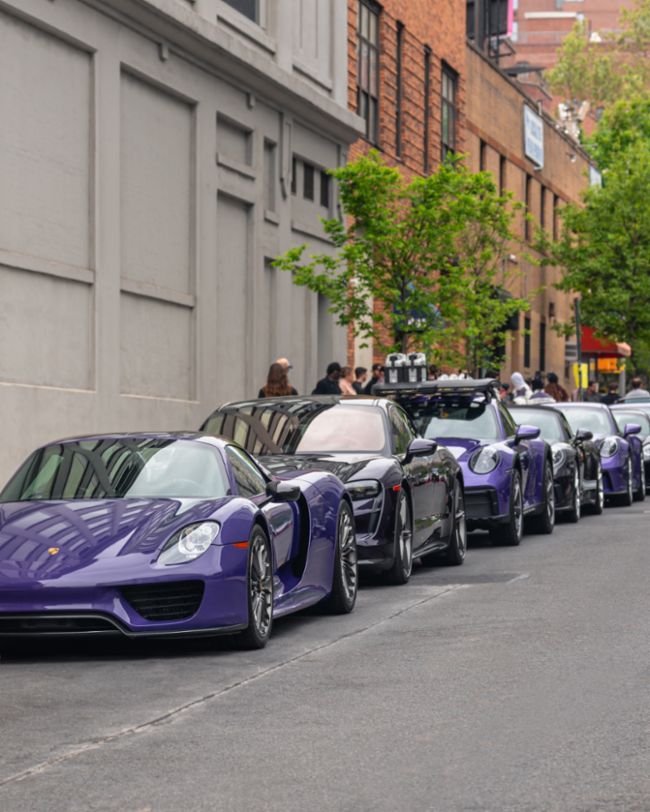 A parade of rare Porsches paints the streets of NYC purple