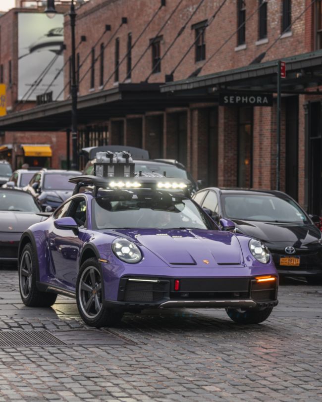 A parade of rare Porsches paints the streets of NYC purple