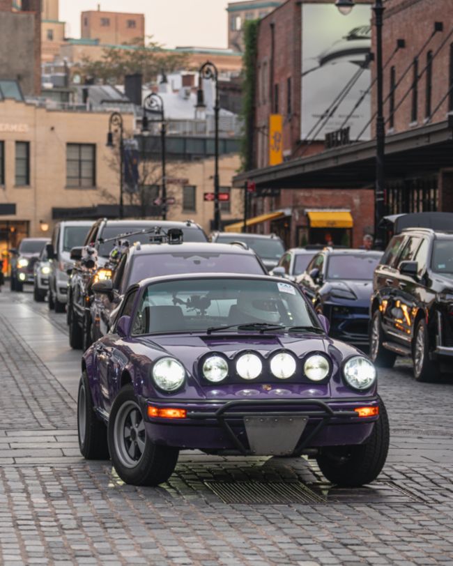 A parade of rare Porsches paints the streets of NYC purple