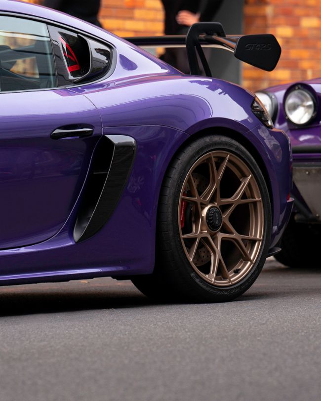 A parade of rare Porsches paints the streets of NYC purple