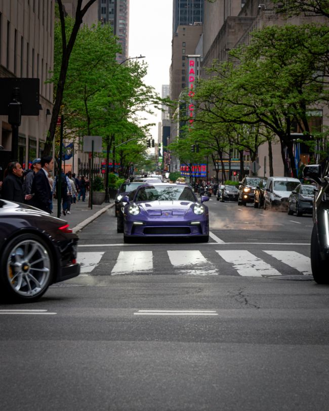 A parade of rare Porsches paints the streets of NYC purple