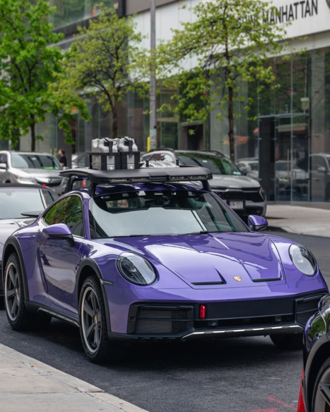 A parade of rare Porsches paints the streets of NYC purple