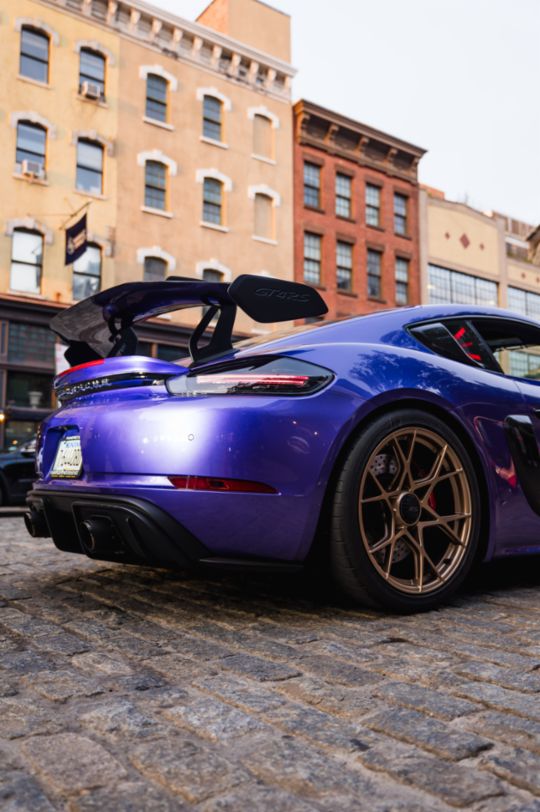 A parade of rare Porsches paints the streets of NYC purple