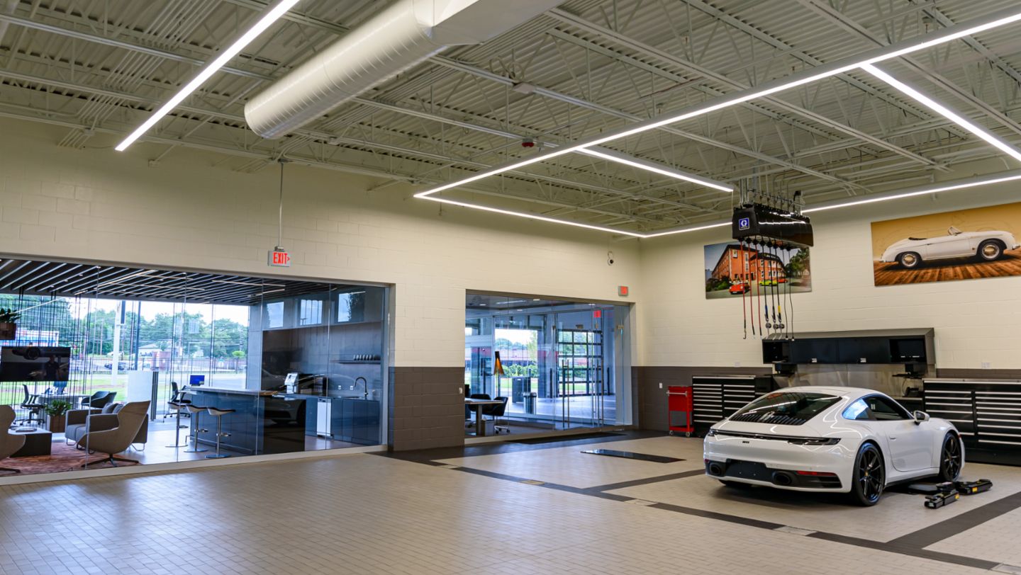A view from the workshop into the customer area at Porsche Service Center South Atlanta, 2021, PCNA
