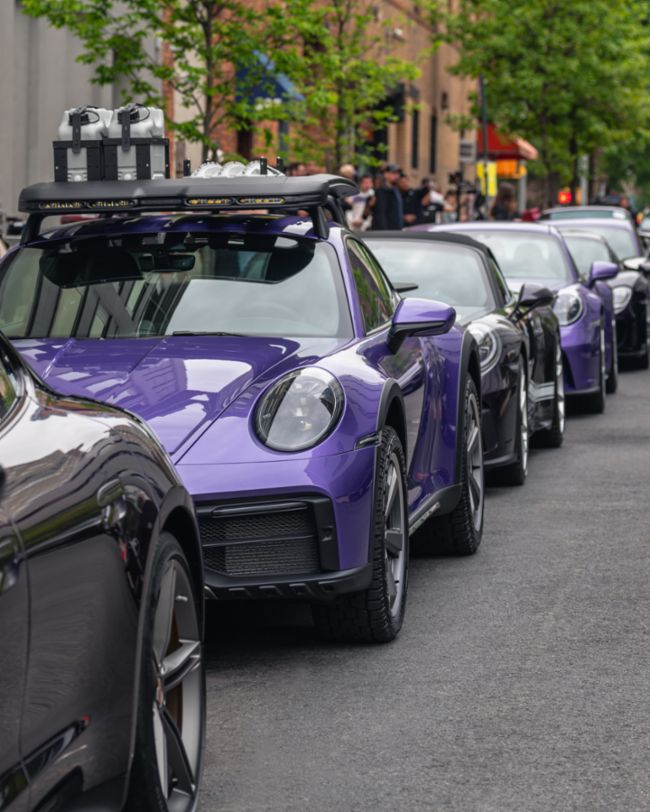 A parade of rare Porsches paints the streets of NYC purple