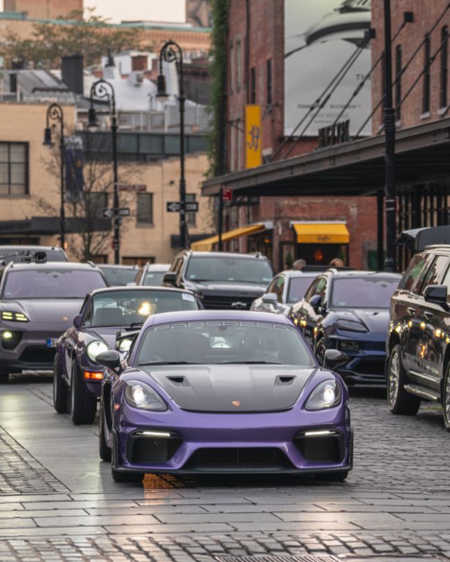 A parade of rare Porsches paints the streets of NYC purple