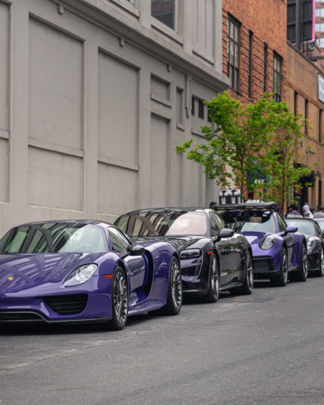 A parade of rare Porsches paints the streets of NYC purple