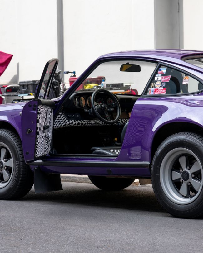 A parade of rare Porsches paints the streets of NYC purple