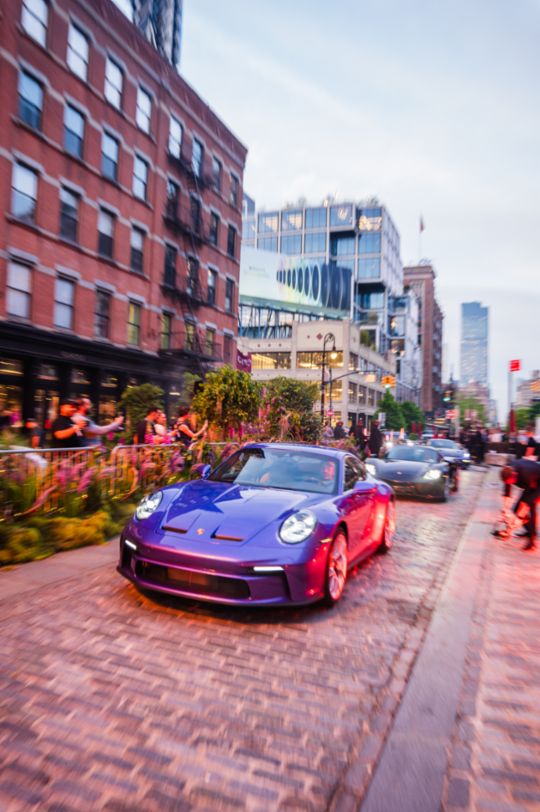 A parade of rare Porsches paints the streets of NYC purple