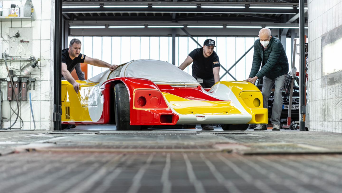 The 962 C being pushed out of the paint shop, 2021, Porsche AG