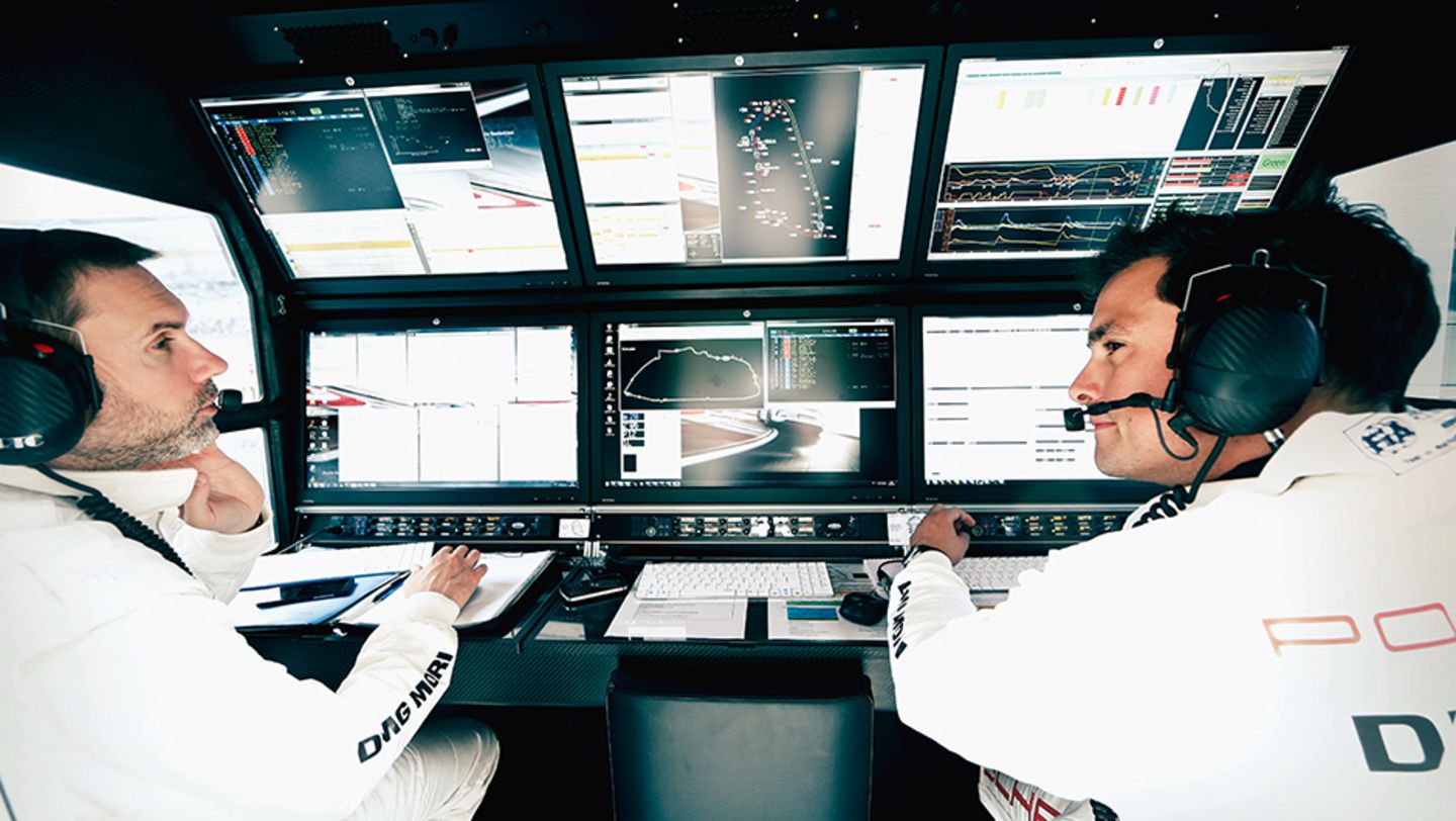 Calm deliberations: Stephen Mitas (right) is all ears for his drivers out on the track.