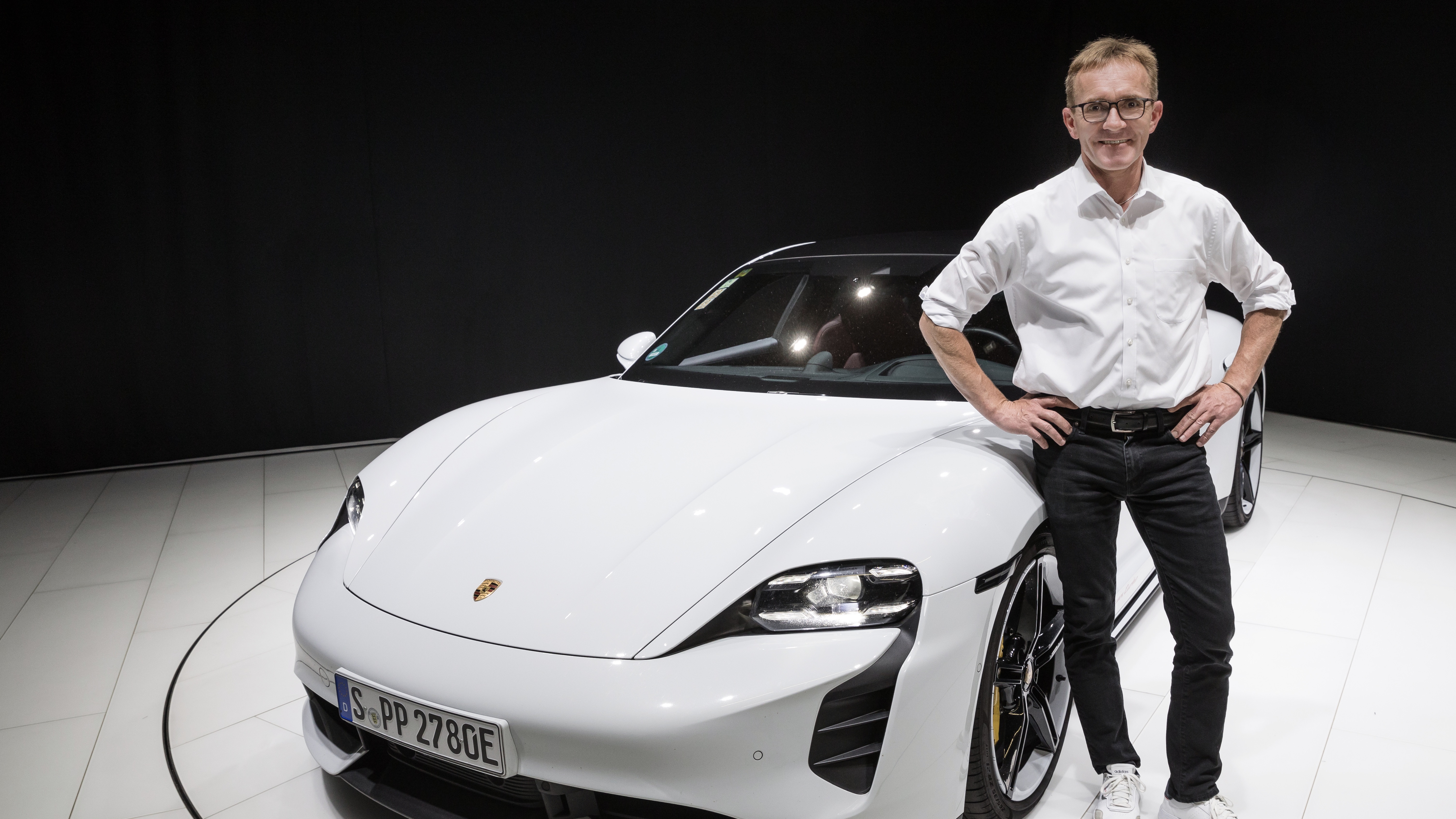 Markus Kreutel, con su Taycan Turbo de empresa cuando tenía 134 911 kilómetros, 2022, Porsche AG