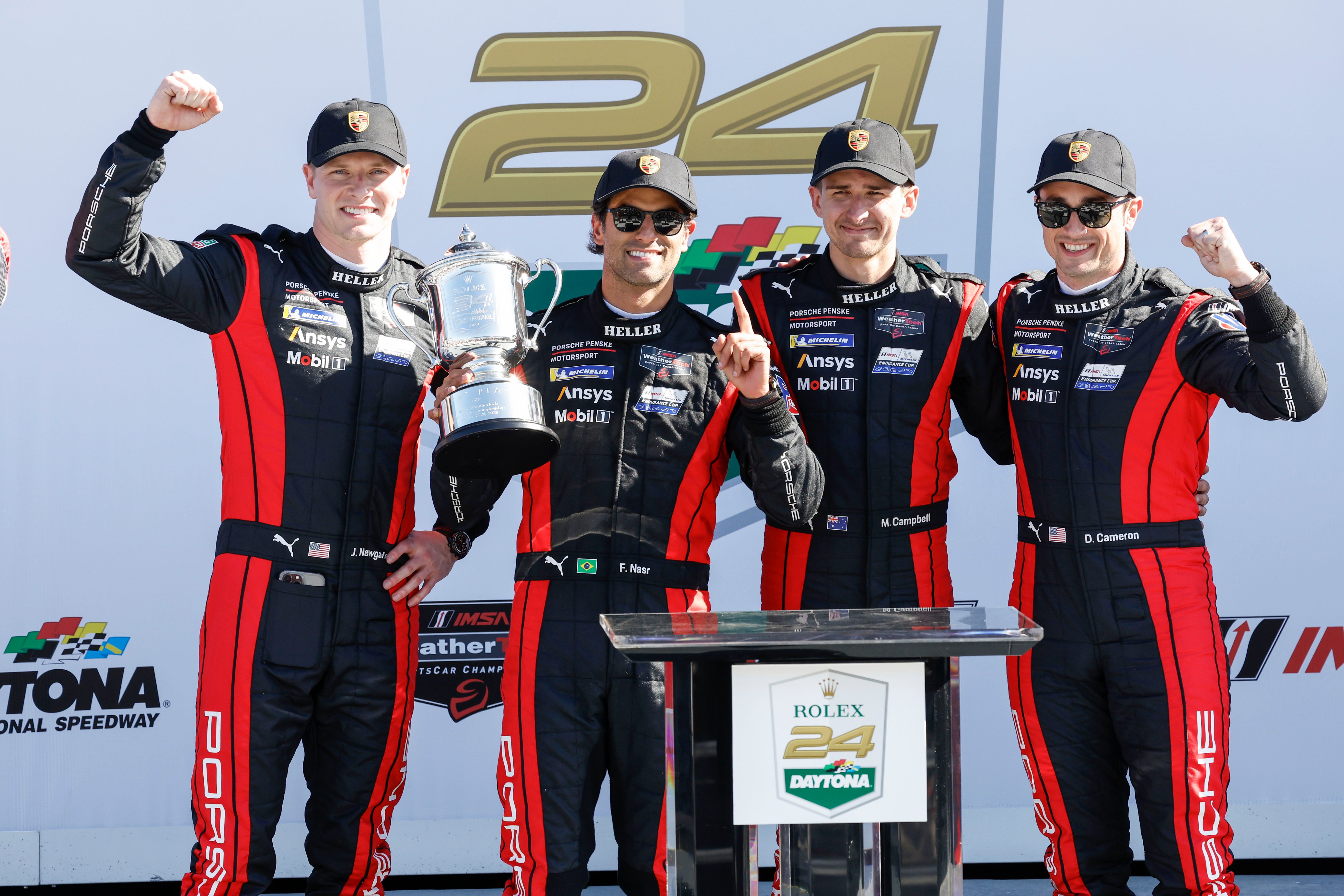 Josef Newgarden, Felipe Nasr, Matt Campbell and Dane Cameron with Daytona trophy
